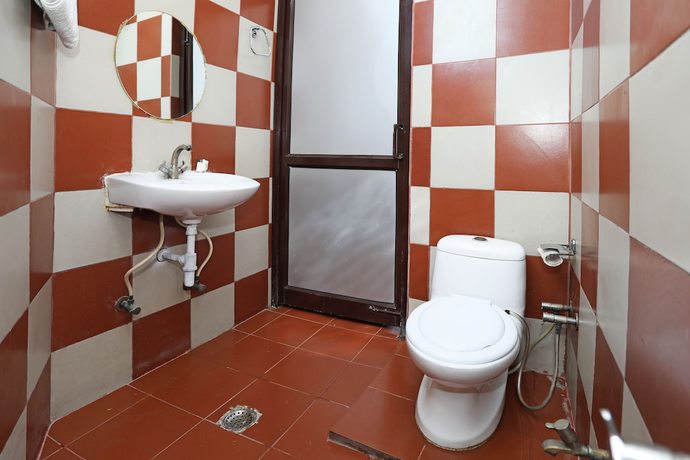 Imagen de la habitación del Hotel OYO 9705 Grand Empire Expressway. Foto 14