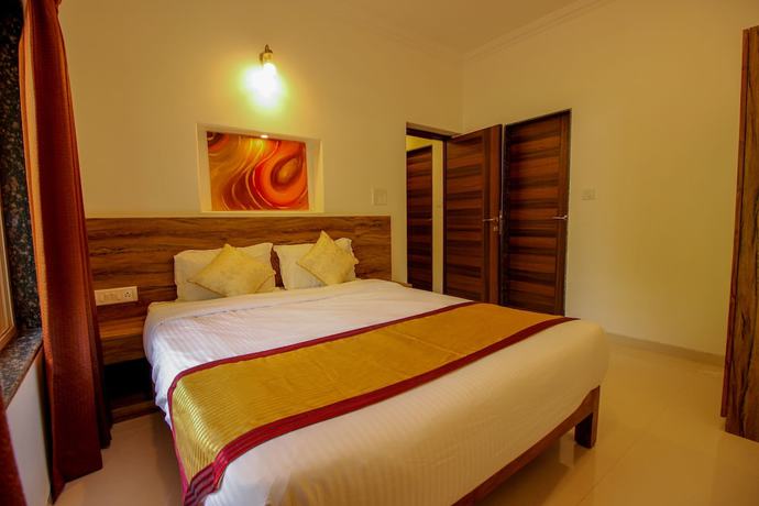 Imagen de la habitación del Hotel OYO 9792 Home 2BHK Poolside Siolim. Foto 6