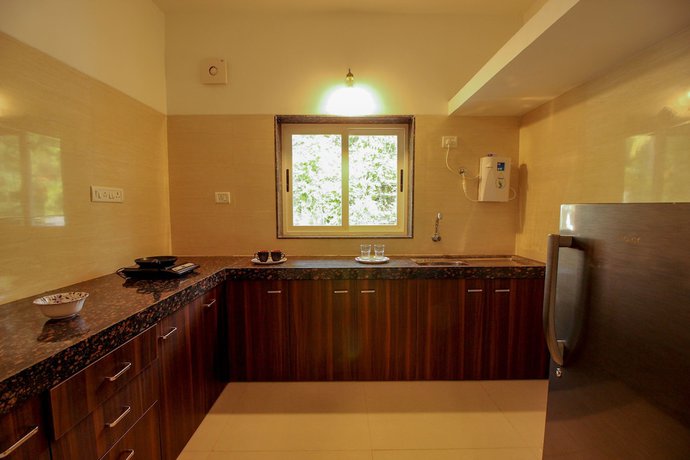 Imagen de la habitación del Hotel OYO 9792 Home 2BHK Poolside Siolim. Foto 7