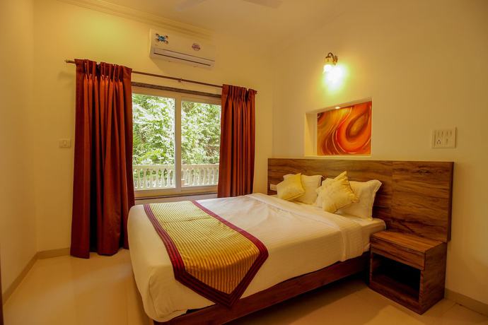 Imagen de la habitación del Hotel OYO 9792 Home 2BHK Poolside Siolim. Foto 8