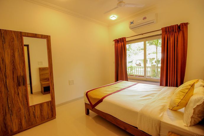 Imagen de la habitación del Hotel OYO 9792 Home 2BHK Poolside Siolim. Foto 9