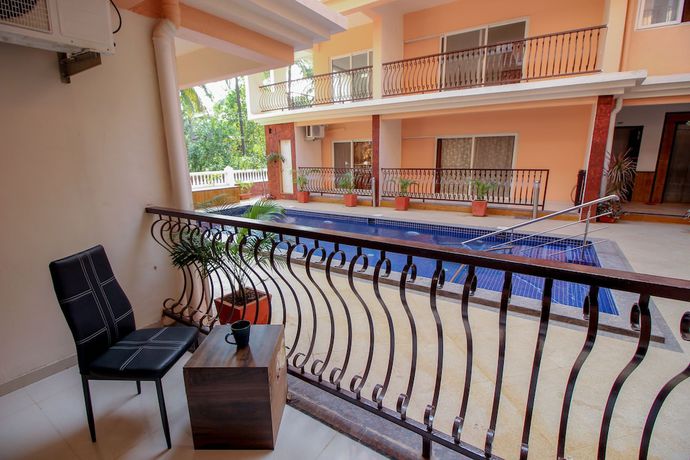 Imagen de la habitación del Hotel OYO 9792 Home 2BHK Poolside Siolim. Foto 11