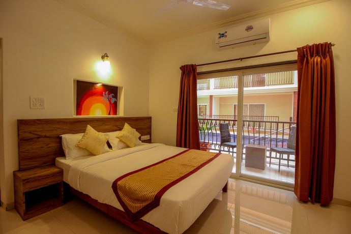 Imagen de la habitación del Hotel OYO 9792 Home 2BHK Poolside Siolim. Foto 14
