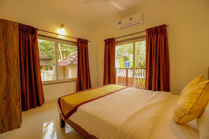 Imagen de la habitación del Hotel OYO 9792 Home 2BHK Poolside Siolim. Foto 17