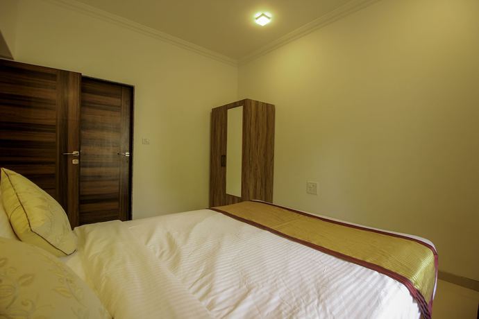 Imagen de la habitación del Hotel OYO 9792 Home 2BHK Poolside Siolim. Foto 18