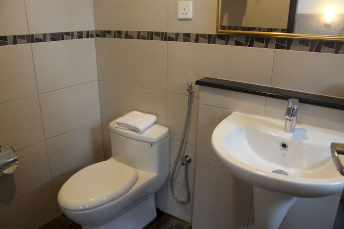 Imagen de la habitación del Hotel OYO 985 Hotel Nur. Foto 5