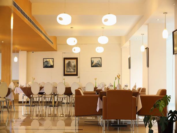 Imagen del bar/restaurante del Hotel OYO 997 Eutopia. Foto 6