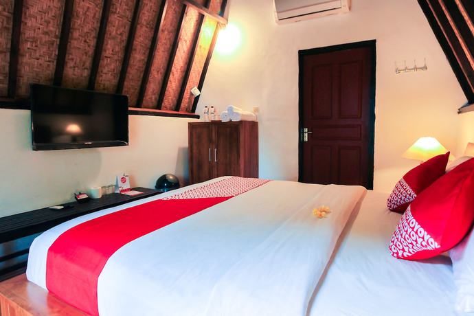 Imagen de la habitación del Hotel OYO 997 Ocean 2 Bungalows. Foto 7