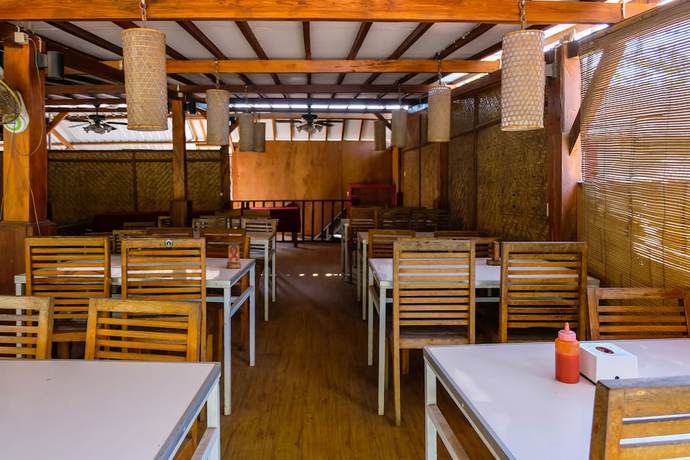 Imagen del bar/restaurante del Hotel OYO 997 Ocean 2 Bungalows. Foto 4