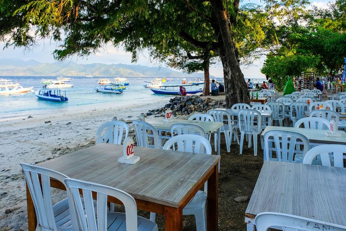 Imagen del bar/restaurante del Hotel OYO 997 Ocean 2 Bungalows. Foto 6