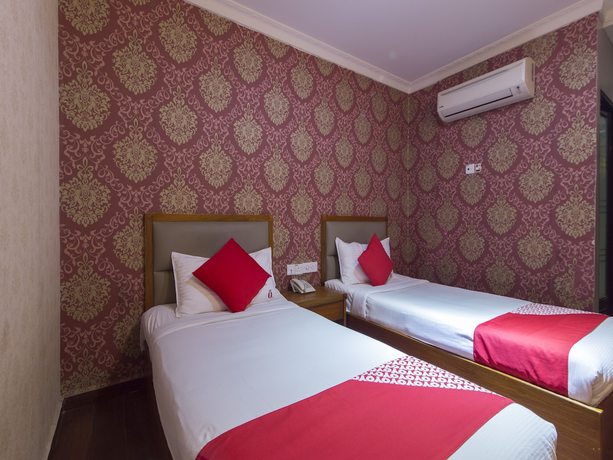 Imagen de la habitación del Hotel OYO 998 Queen City. Foto 2