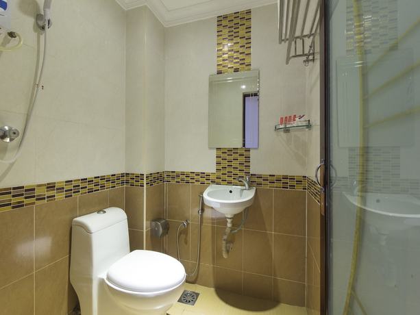 Imagen de la habitación del Hotel OYO 998 Queen City. Foto 4