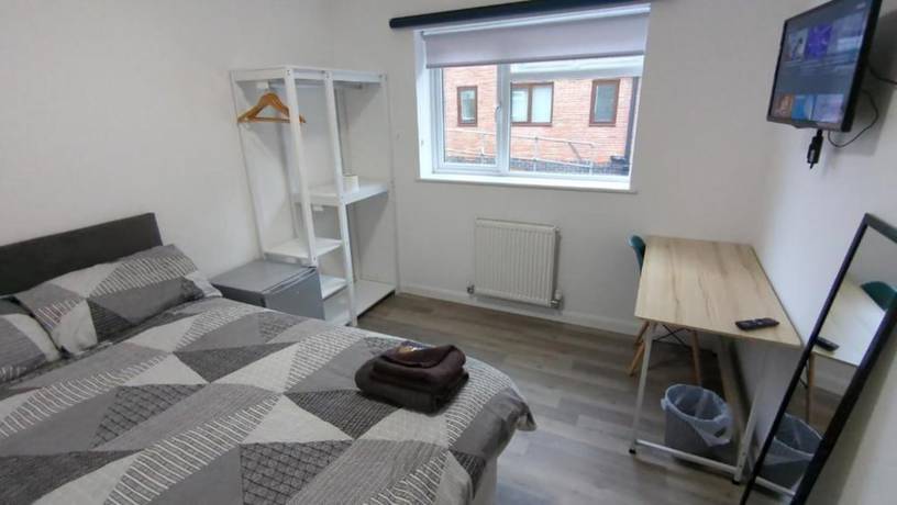 Imagen de la habitación del Hotel OYO Aparthotel Hathern. Foto 4