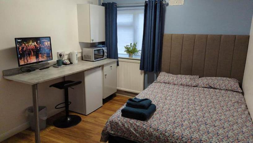 Imagen de la habitación del Hotel OYO Aparthotel Hathern. Foto 7