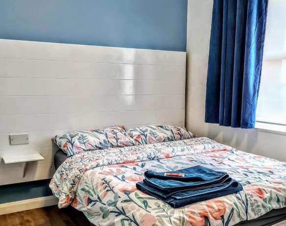 Imagen de la habitación del Hotel OYO Aparthotel Hathern. Foto 8