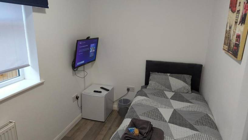 Imagen de la habitación del Hotel OYO Aparthotel Hathern. Foto 9