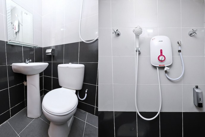 Imagen de la habitación del Hotel OYO Aryina. Foto 1