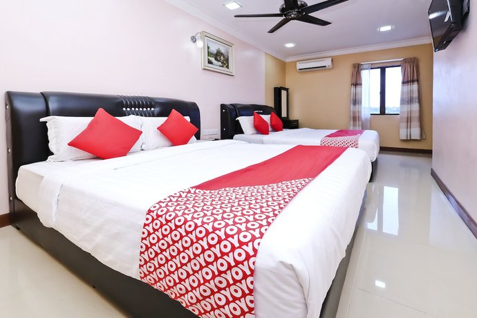 Imagen de la habitación del Hotel OYO Aryina. Foto 2