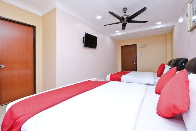 Imagen de la habitación del Hotel OYO Aryina. Foto 3