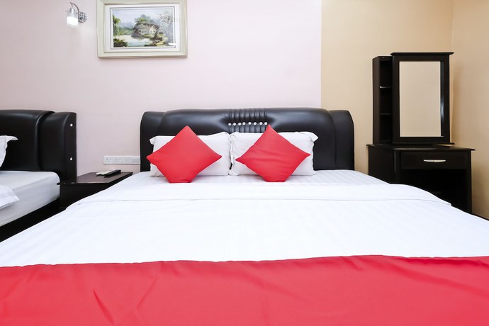 Imagen de la habitación del Hotel OYO Aryina. Foto 4