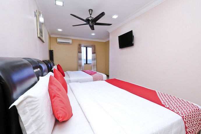 Imagen de la habitación del Hotel OYO Aryina. Foto 5