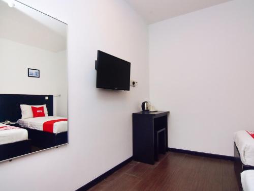 Imagen de la habitación del Hotel OYO Astana Hotel. Foto 13