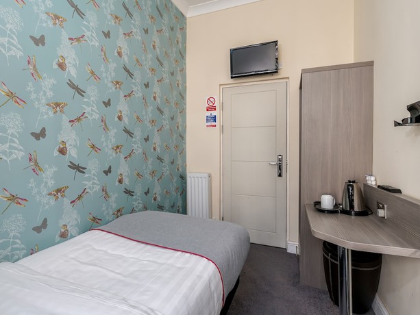 Imagen de la habitación del Hotel OYO Bakers London Victoria. Foto 13