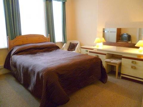 Imagen de la habitación del Hotel OYO Belvedere Guest House. Foto 3