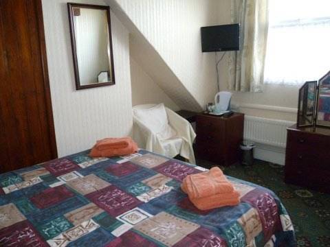 Imagen de la habitación del Hotel OYO Belvedere Guest House. Foto 9