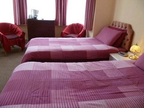 Imagen de la habitación del Hotel OYO Belvedere Guest House. Foto 14