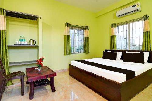 Imagen de la habitación del Hotel OYO Bijaya Residency. Foto 19