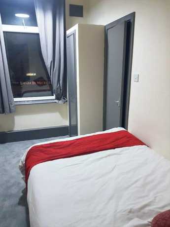 Imagen de la habitación del Hotel OYO Binglea. Foto 4