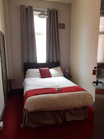 Imagen de la habitación del Hotel OYO Binglea. Foto 6