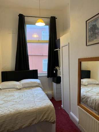 Imagen de la habitación del Hotel OYO Binglea. Foto 10