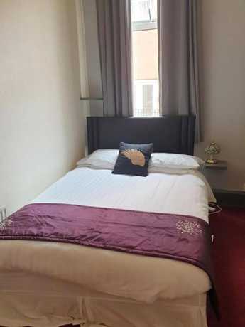 Imagen de la habitación del Hotel OYO Binglea. Foto 11