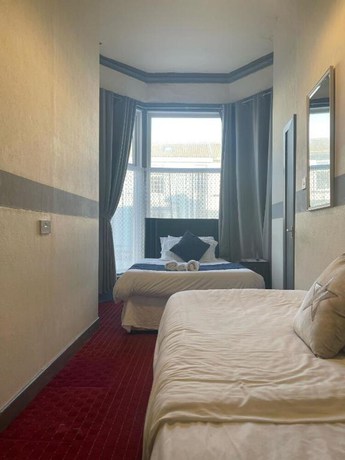 Imagen de la habitación del Hotel OYO Binglea. Foto 12