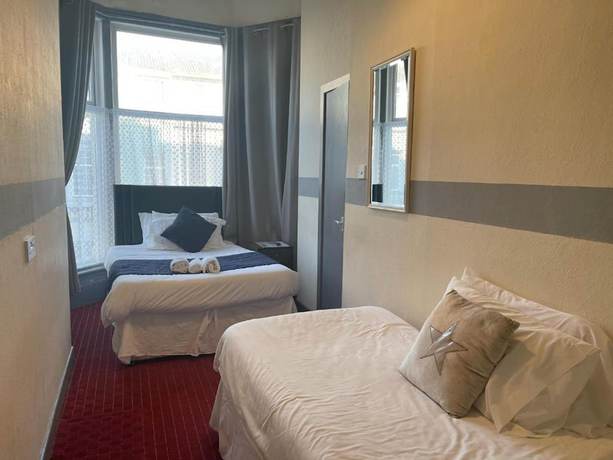 Imagen de la habitación del Hotel OYO Binglea. Foto 15
