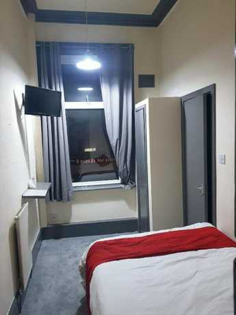 Imagen de la habitación del Hotel OYO Binglea. Foto 16