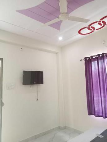 Imagen de la habitación del Hotel OYO Bliss. Foto 20