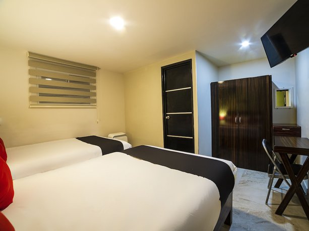 Imagen de la habitación del Hotel OYO Boutique Las Campanas. Foto 4