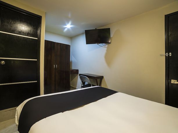 Imagen de la habitación del Hotel OYO Boutique Las Campanas. Foto 5