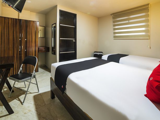 Imagen de la habitación del Hotel OYO Boutique Las Campanas. Foto 12