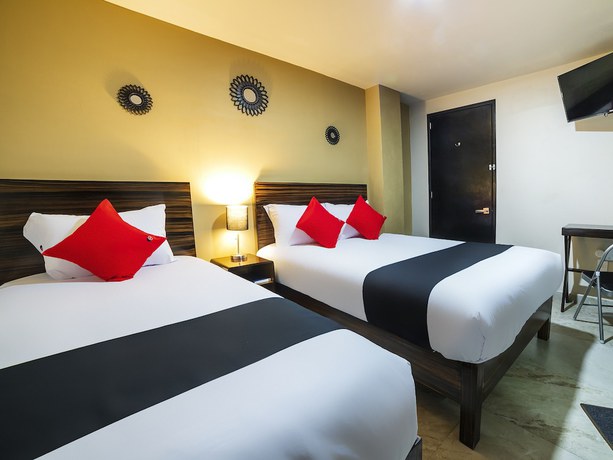 Imagen de la habitación del Hotel OYO Boutique Las Campanas. Foto 15