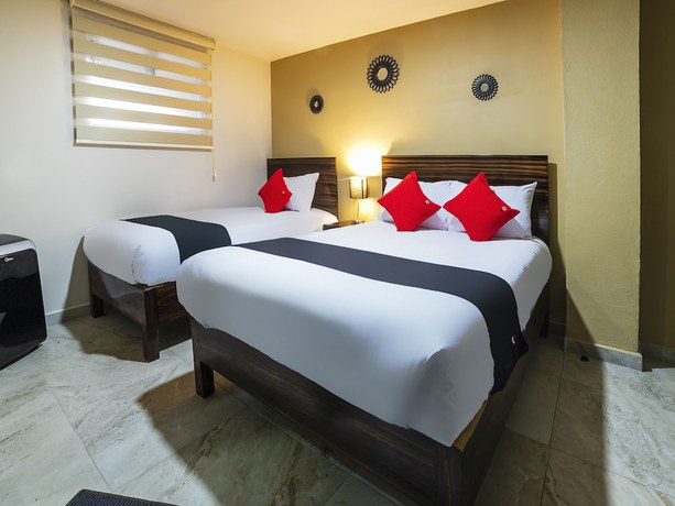 Imagen de la habitación del Hotel OYO Boutique Las Campanas. Foto 19