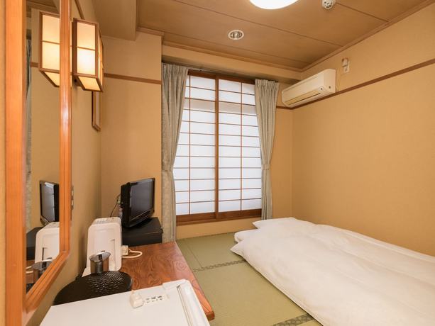 Imagen de la habitación del Hotel OYO Business Hotel Koyo. Foto 2