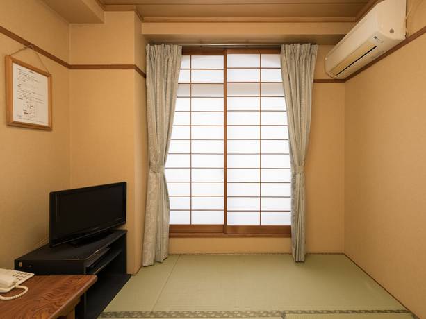 Imagen de la habitación del Hotel OYO Business Hotel Koyo. Foto 3