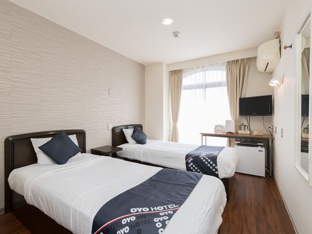 Imagen de la habitación del Hotel OYO Business Hotel Koyo. Foto 4