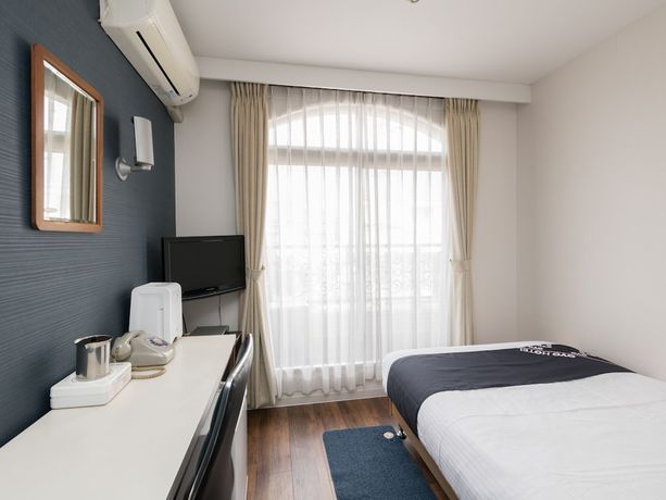 Imagen de la habitación del Hotel OYO Business Hotel Koyo. Foto 6