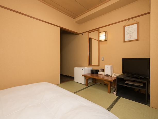 Imagen de la habitación del Hotel OYO Business Hotel Koyo. Foto 7
