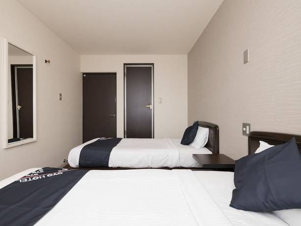Imagen de la habitación del Hotel OYO Business Hotel Koyo. Foto 8